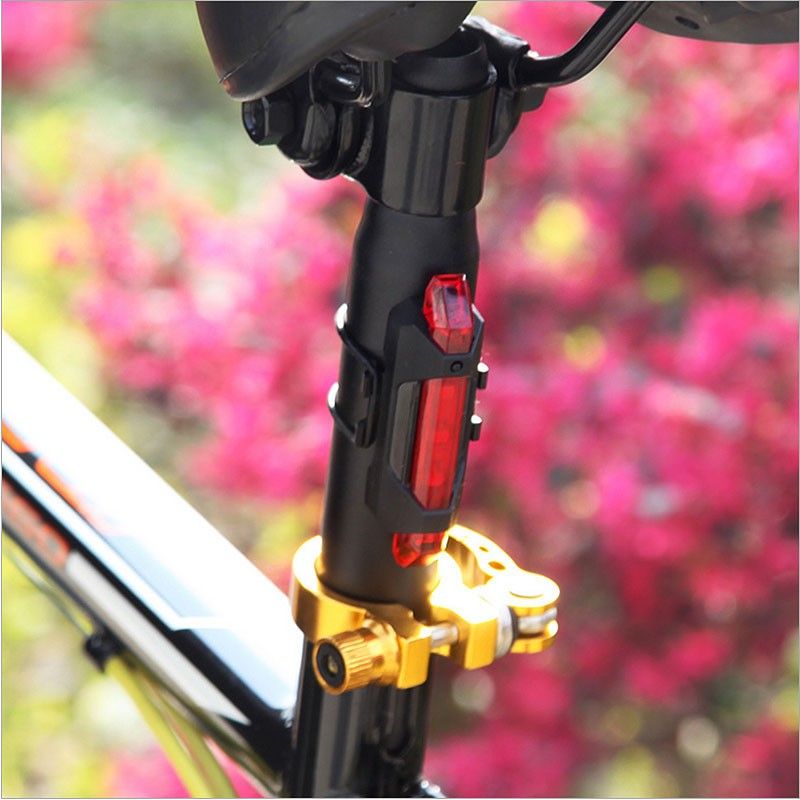 Luz trasera para bicicleta USB recargable con modos de flash dinámicos diseño elegante y mejora de visibilidad
